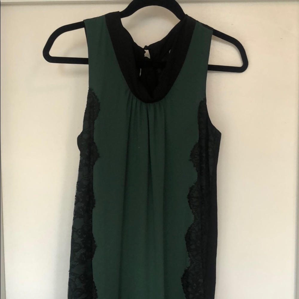 Black and green sleeveless dress with lace